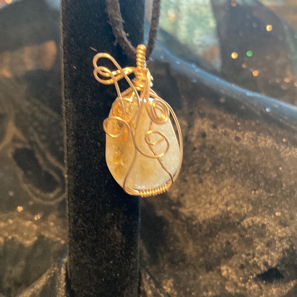 Citrine stone wire wrapped pendant.